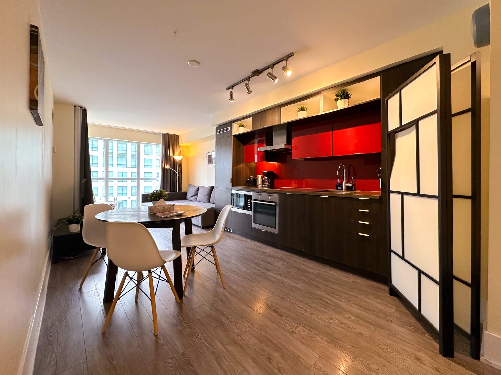 Atmos 1 Bedroom + Den · Sofa Bed — photo 1